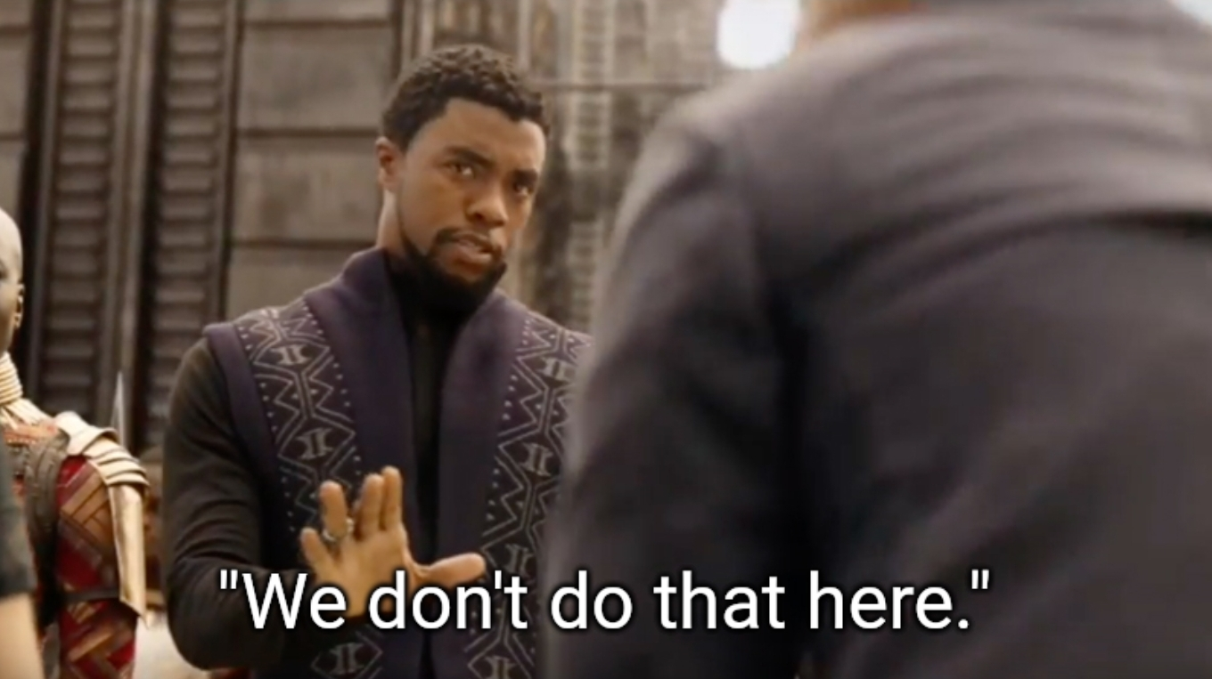 Black Panther raising his hands with the caption "We don't do that here."