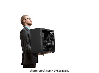Stock photo of a man carrying a desktop computer