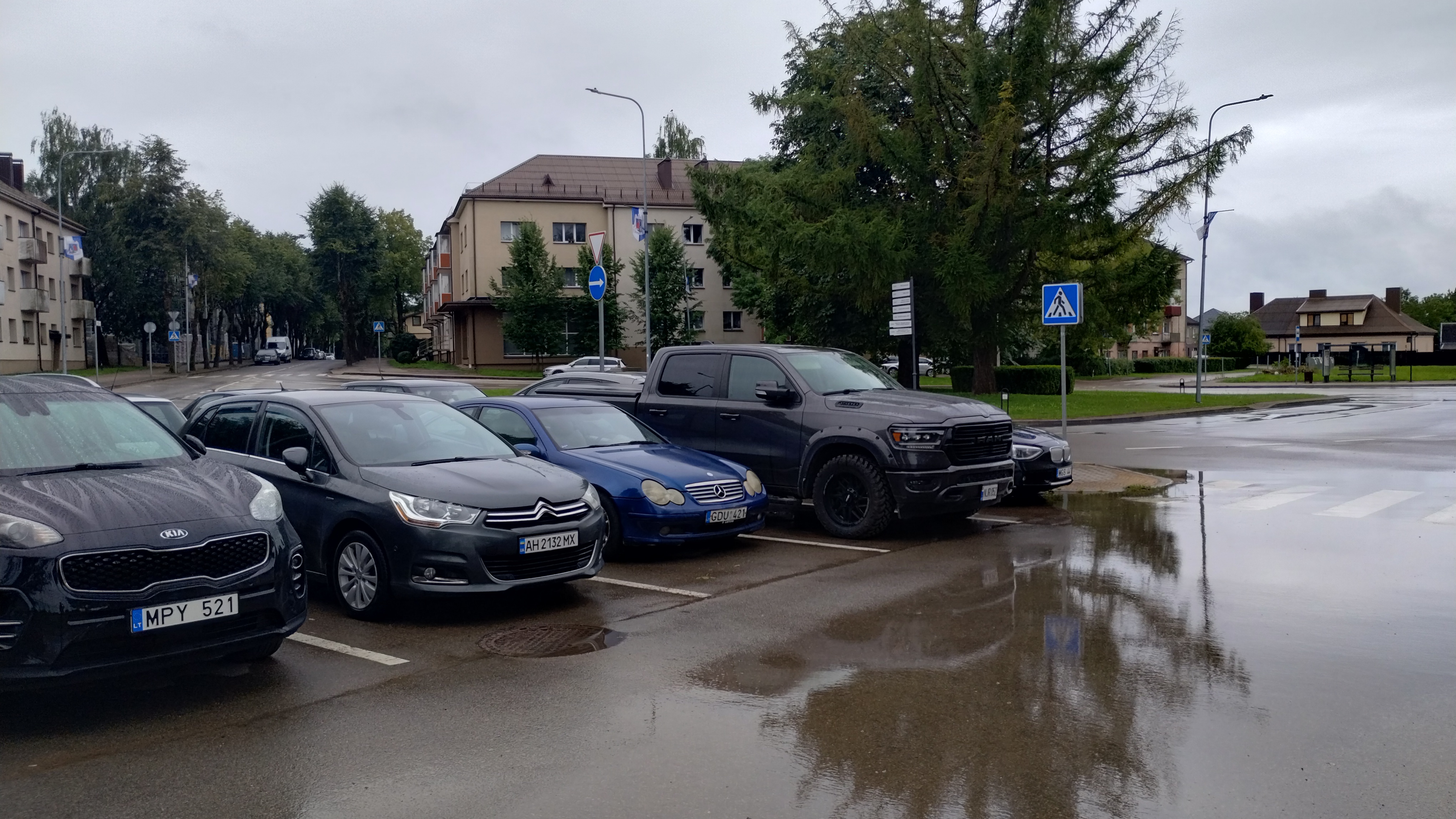 Picture of a massive pickup in a European parking lot